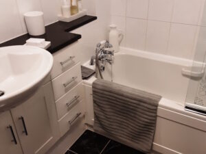 Photo of clients bathroom before starting their accessible bathroom adaptation