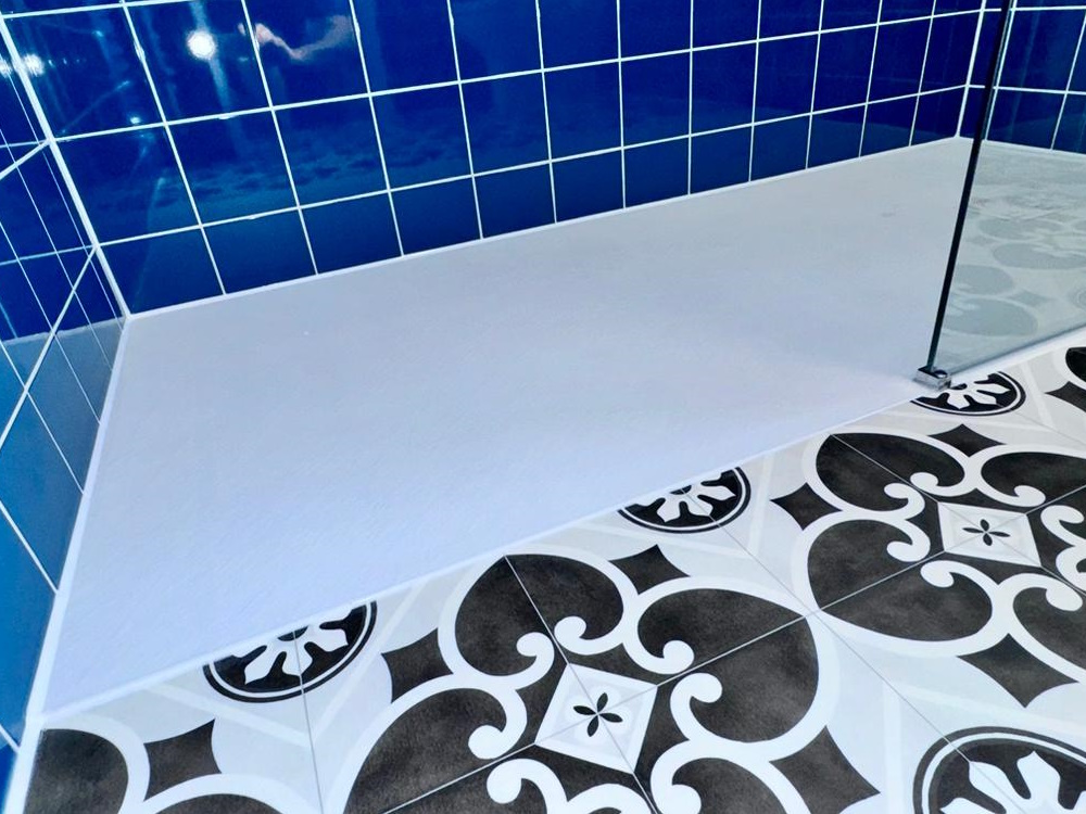 Photo of personalised tiles selected by one of our customers for their stunning new accessible bathroom