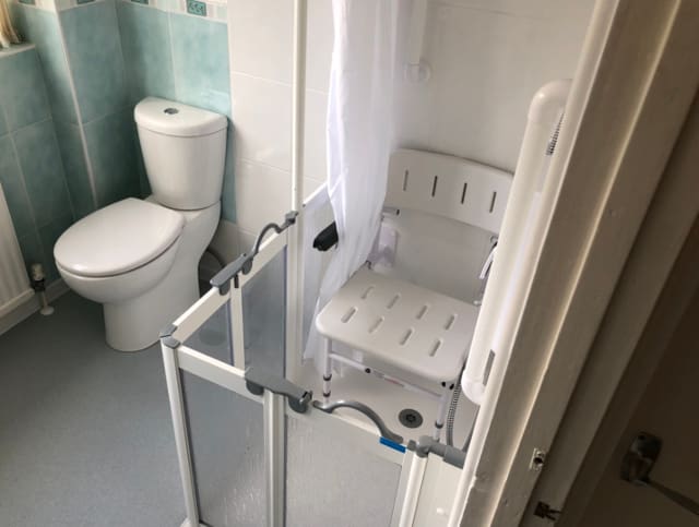 New shower area with half height doors