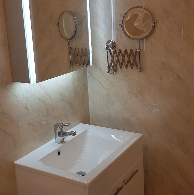 lit vanity unit in accessible bathroom