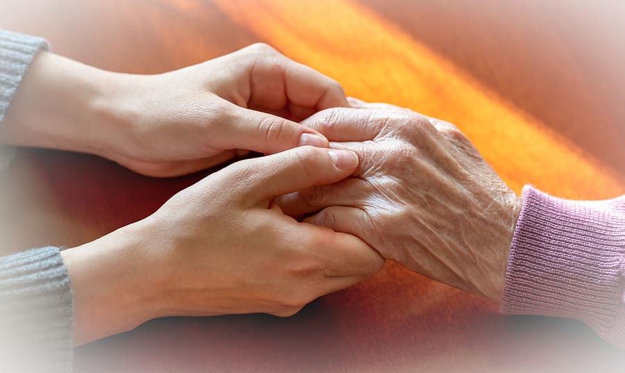 Bigstock Elderly Hands Helping Hands O 365834089