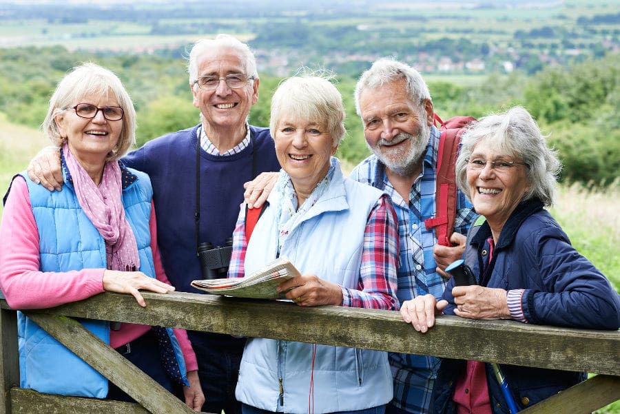 group of senior friends walking