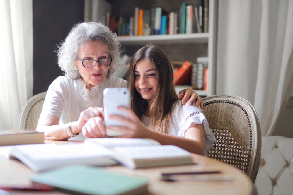 Gran and granddaughter in multi-generational home