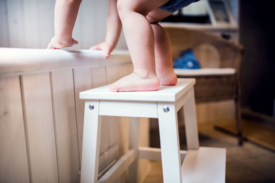 Toddler trying to get into bath