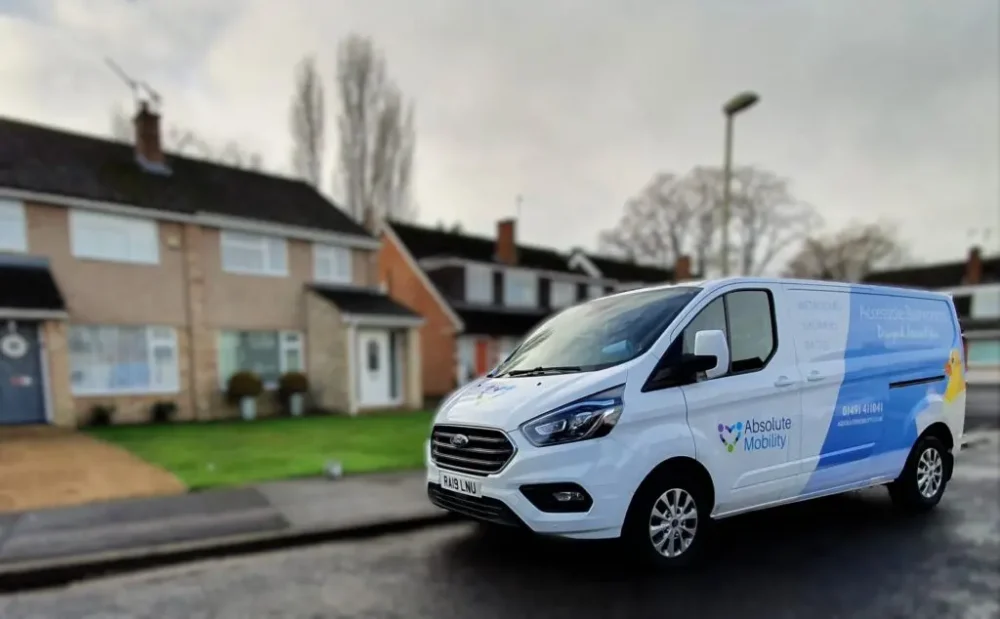 Absolute Mobility Van Outside A Clients House