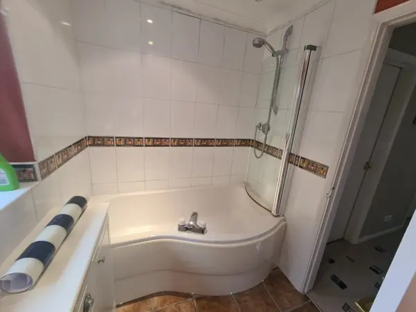 Morse Bathroom Before Renovation Curved Bath With No Easy Access And Overhead Shower