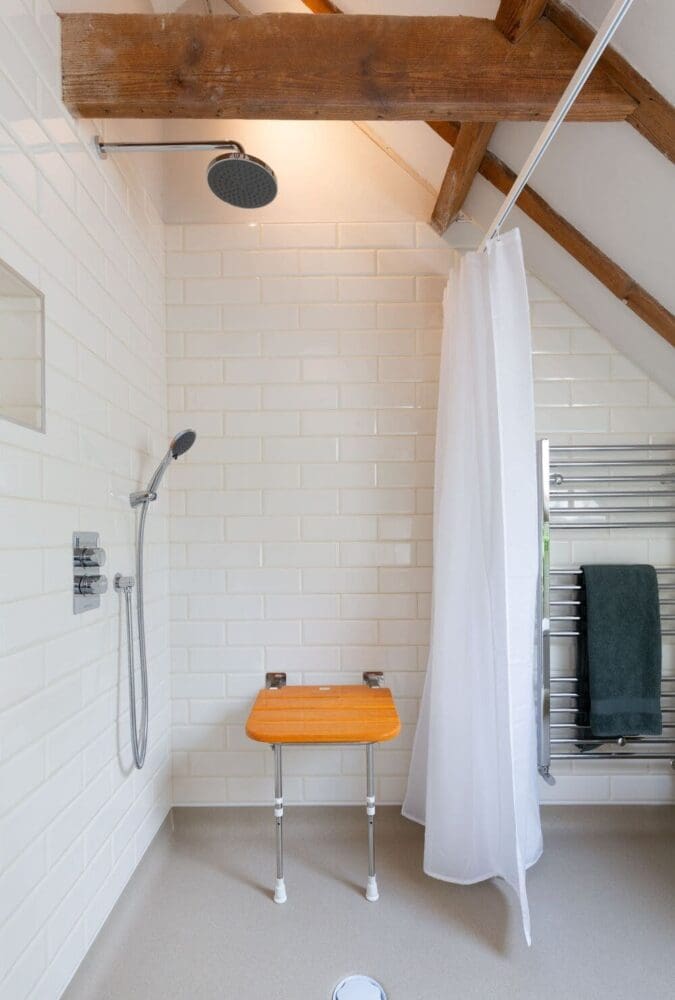 Mr And Mrs W's Bathroom After Renovation Large Walk In Shower With Shower Seat And Exposed Wood Trusses In The Cieling