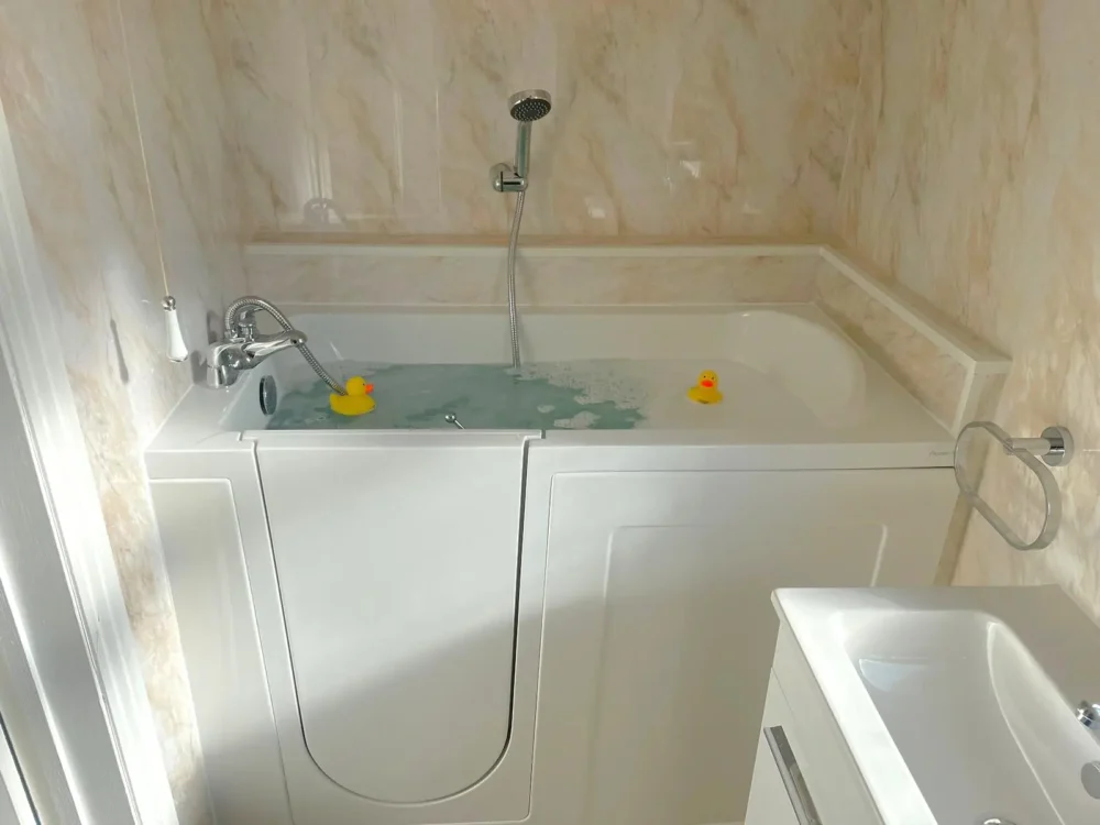 Walk In Tub Style Bath With Handheld Shower, Filled Up With Rubber Ducks