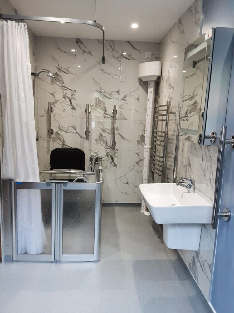 Wet Room Renovation With Body Dryer, Shower, Seat, Grab Rails And Towel Rail