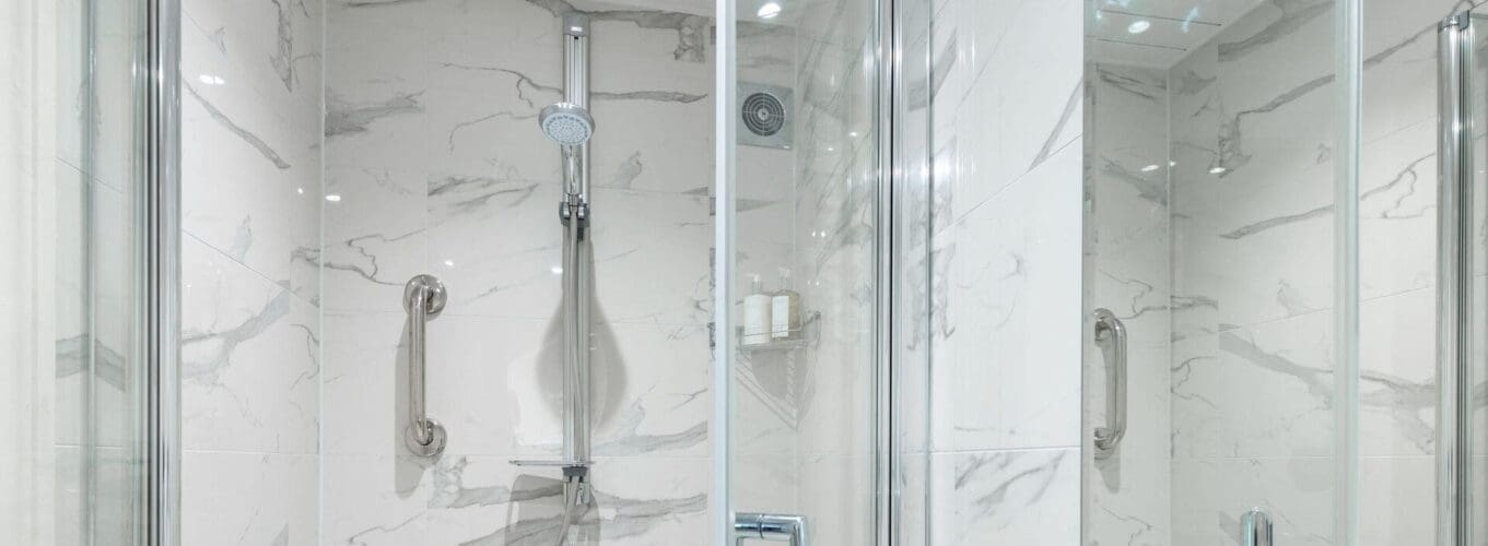 Walk In Shower With White Marble Effect Wall Tiles