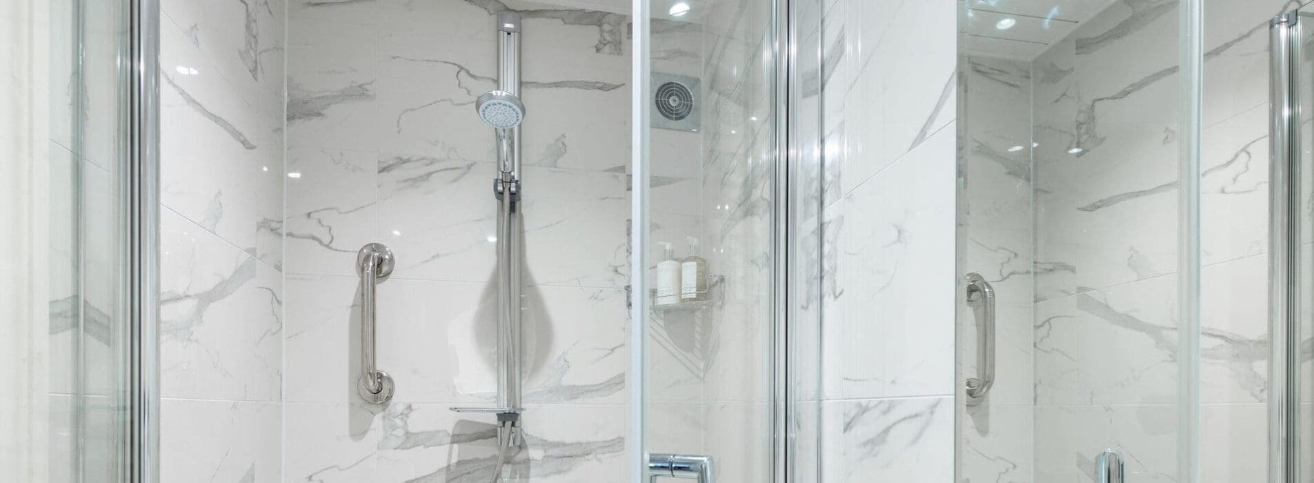 Walk In Shower With White Marble Effect Wall Tiles