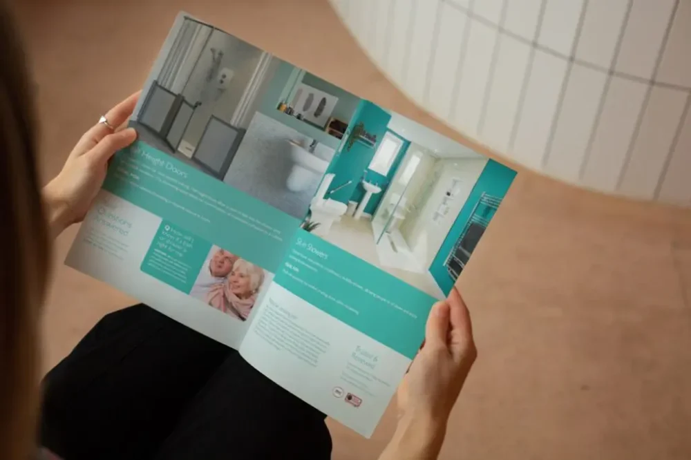 Woman reading Absolute Mobility Brochure